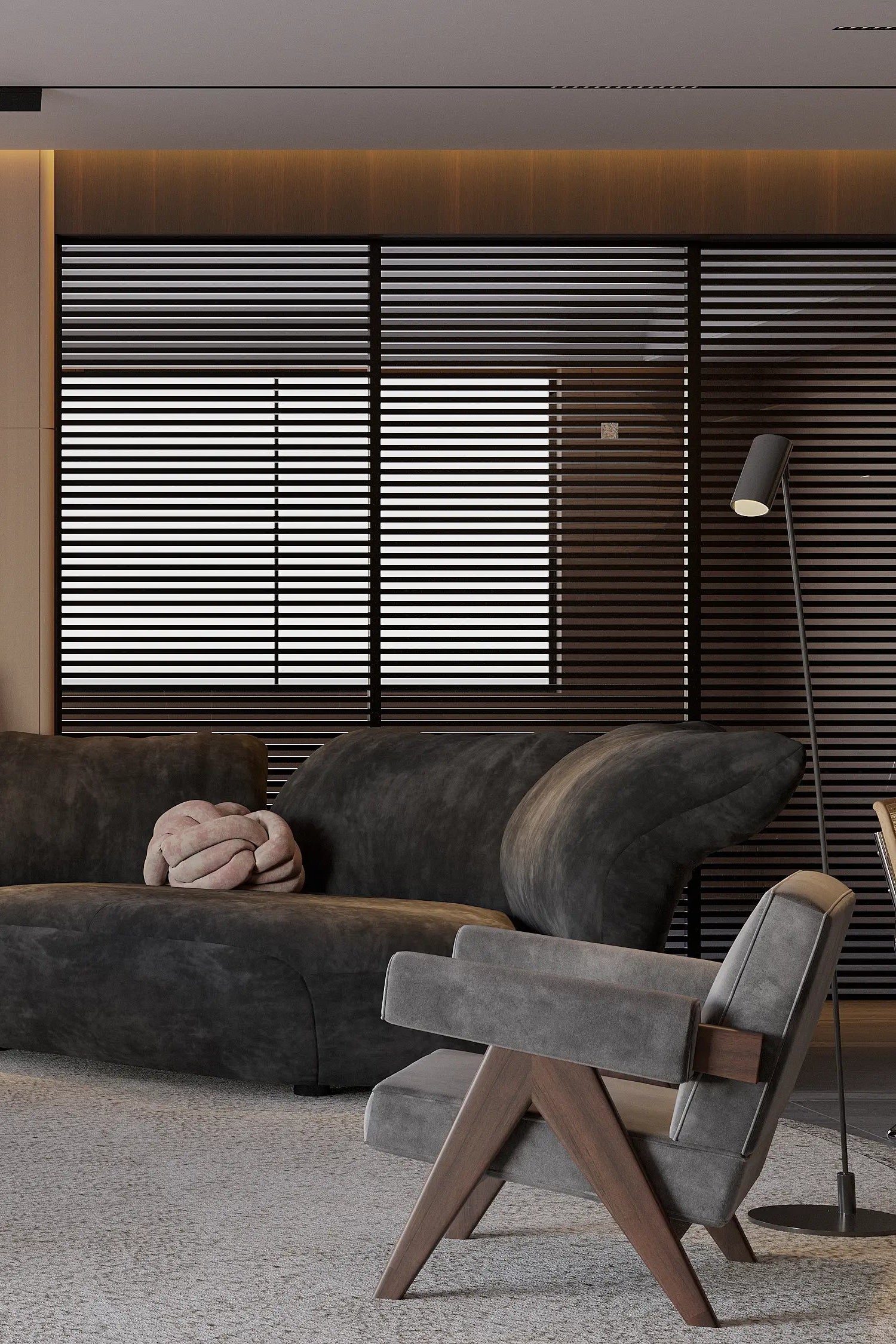 Detail of Cesca cane dining chair beside dark walnut pedestal table in minimalist interior.
